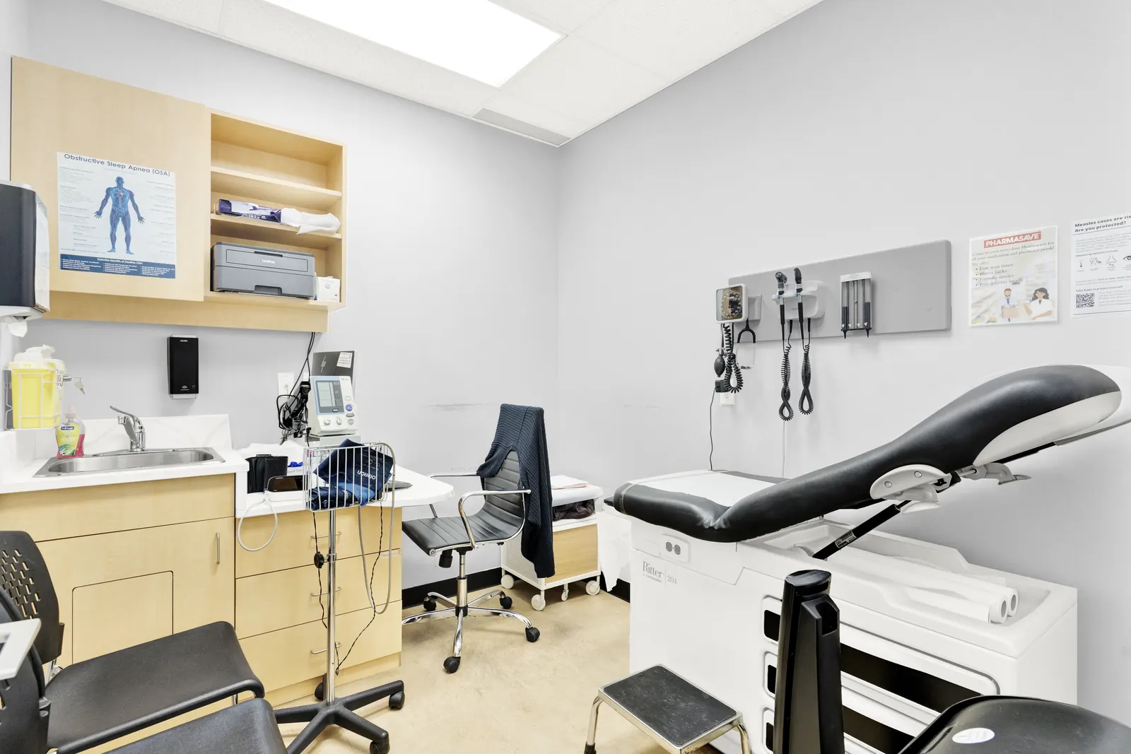 Exam room with blood pressure and diagnostic equipment